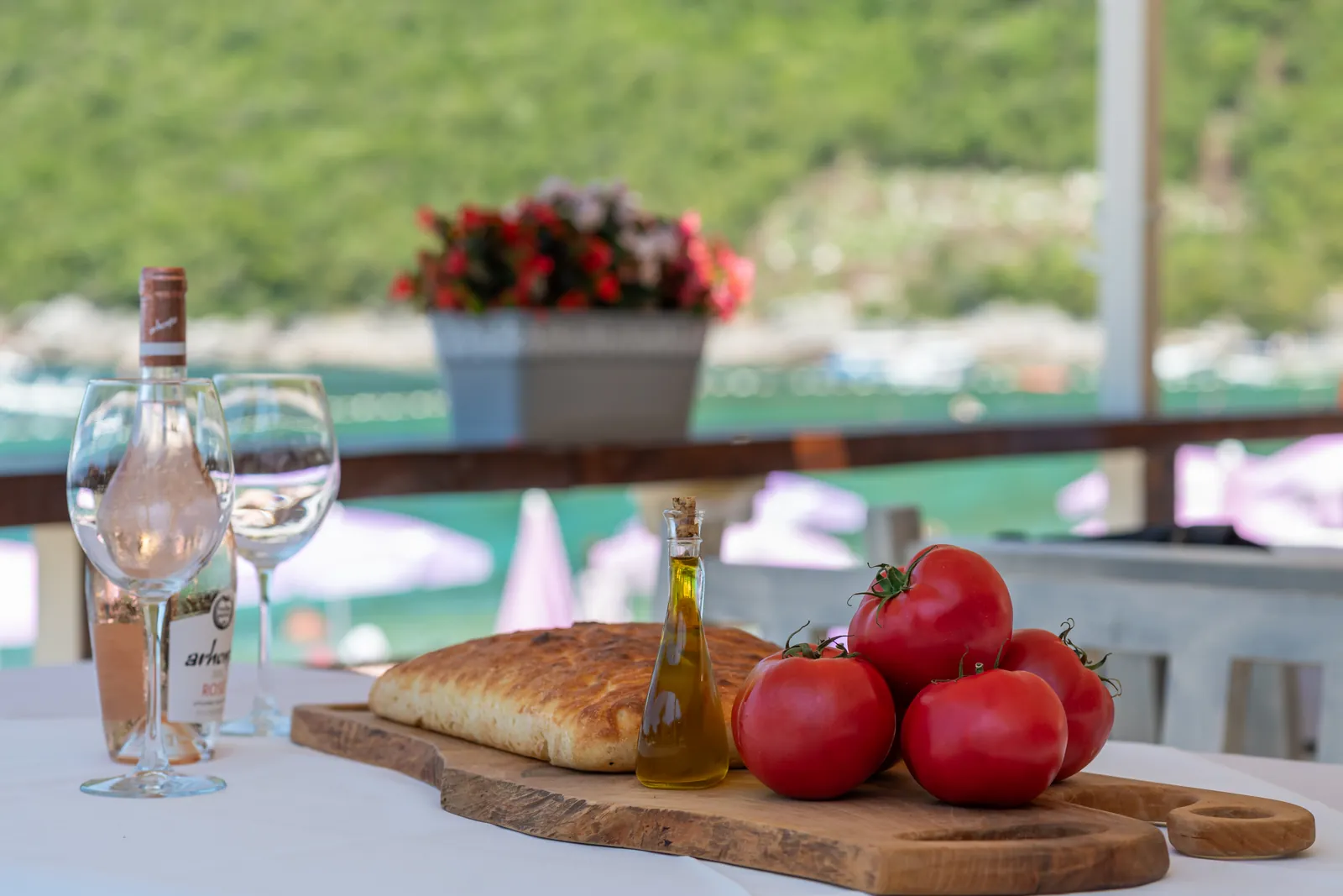 Homemade bread, tomatoes and olive oil