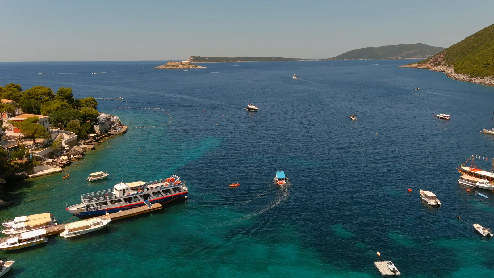 Excursion boats leaving Žanjice toward the Blue Cave