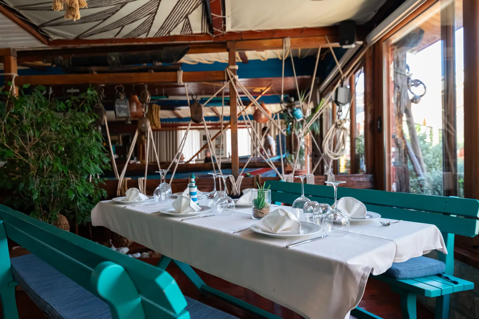 A set table with a white tablecloth